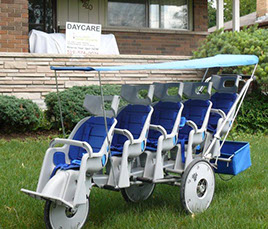 Trips to parks, libraries, and around the neighbourhood in a 4 seater stroller with "stadium seating". Children see all that is going on.